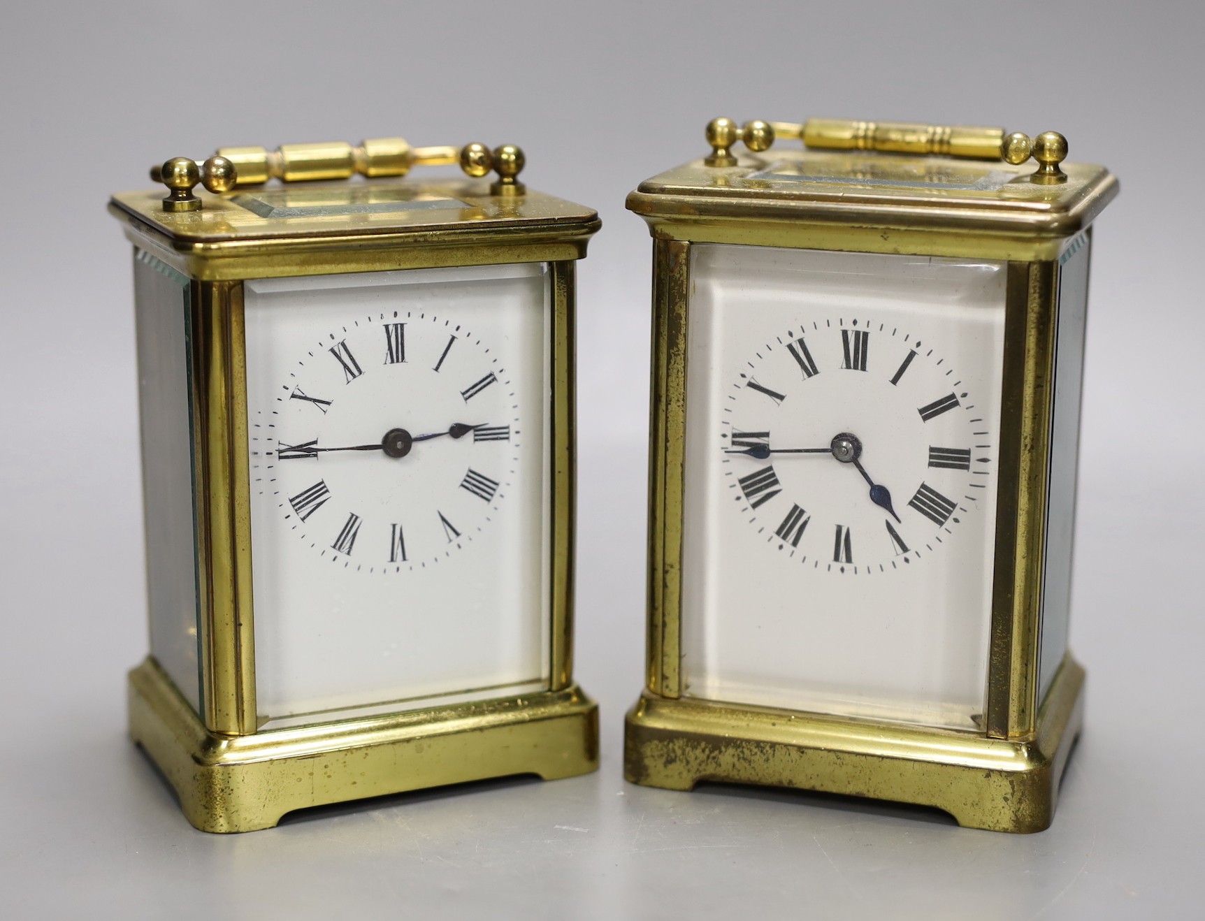 Two brass cased carriage timepieces. Tallest 12cm